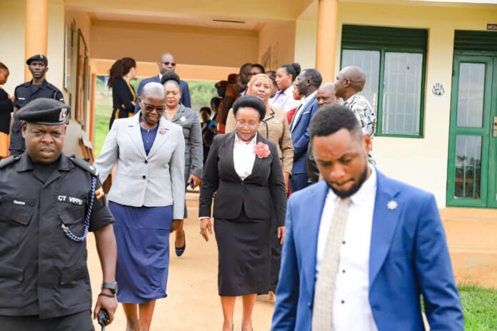 Judiciary and security officials during a court monitoring visit in Uganda